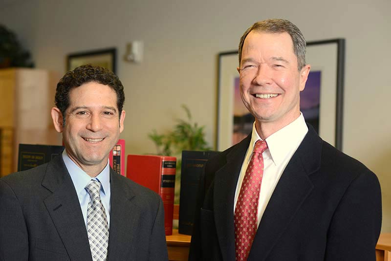 Personal injury lawyers Aron Yarmo and Jim Bailey, located in Bend, Oregon.